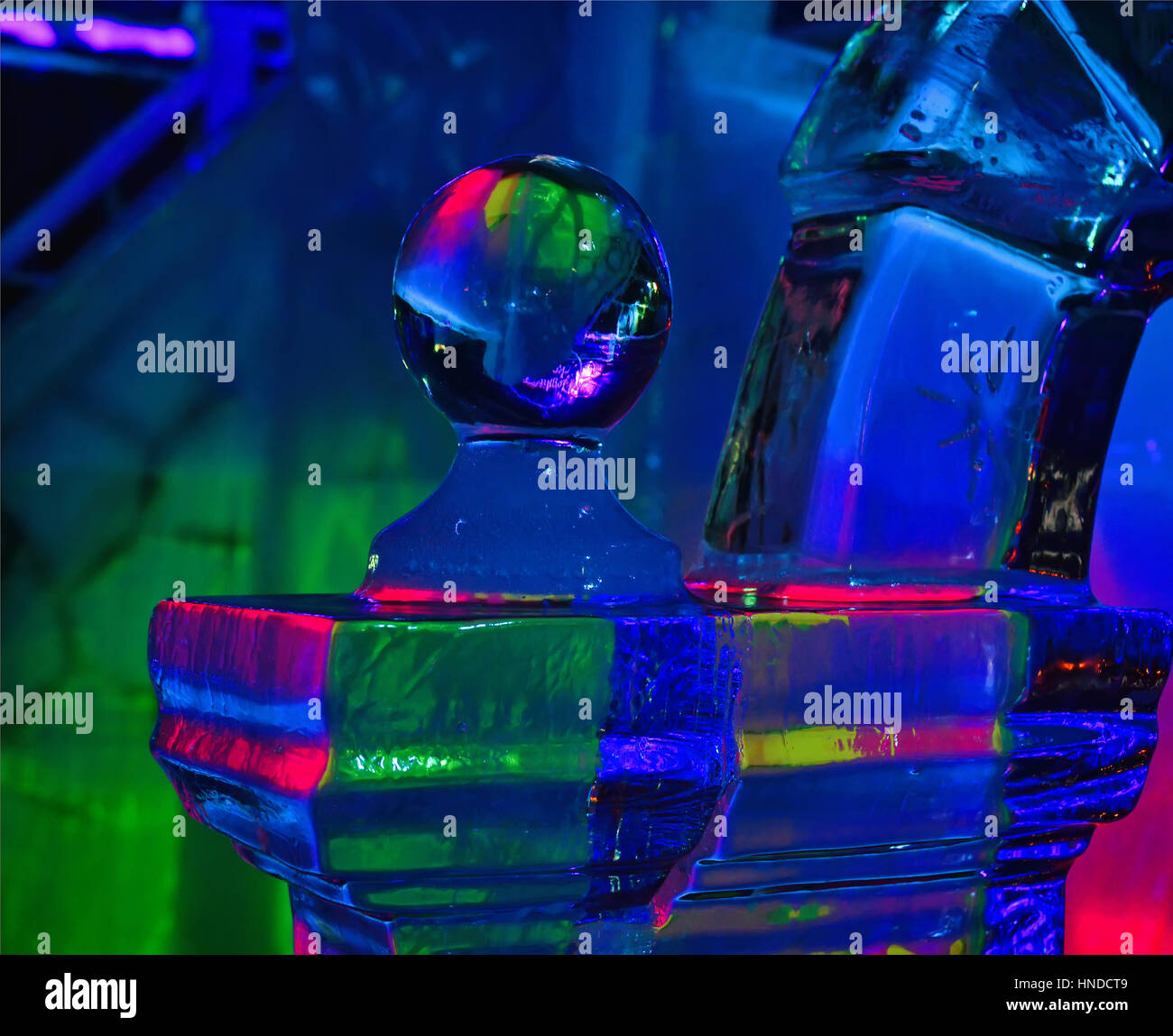 Detail of a sculpture made of ice with multicolored lights Stock Photo ...