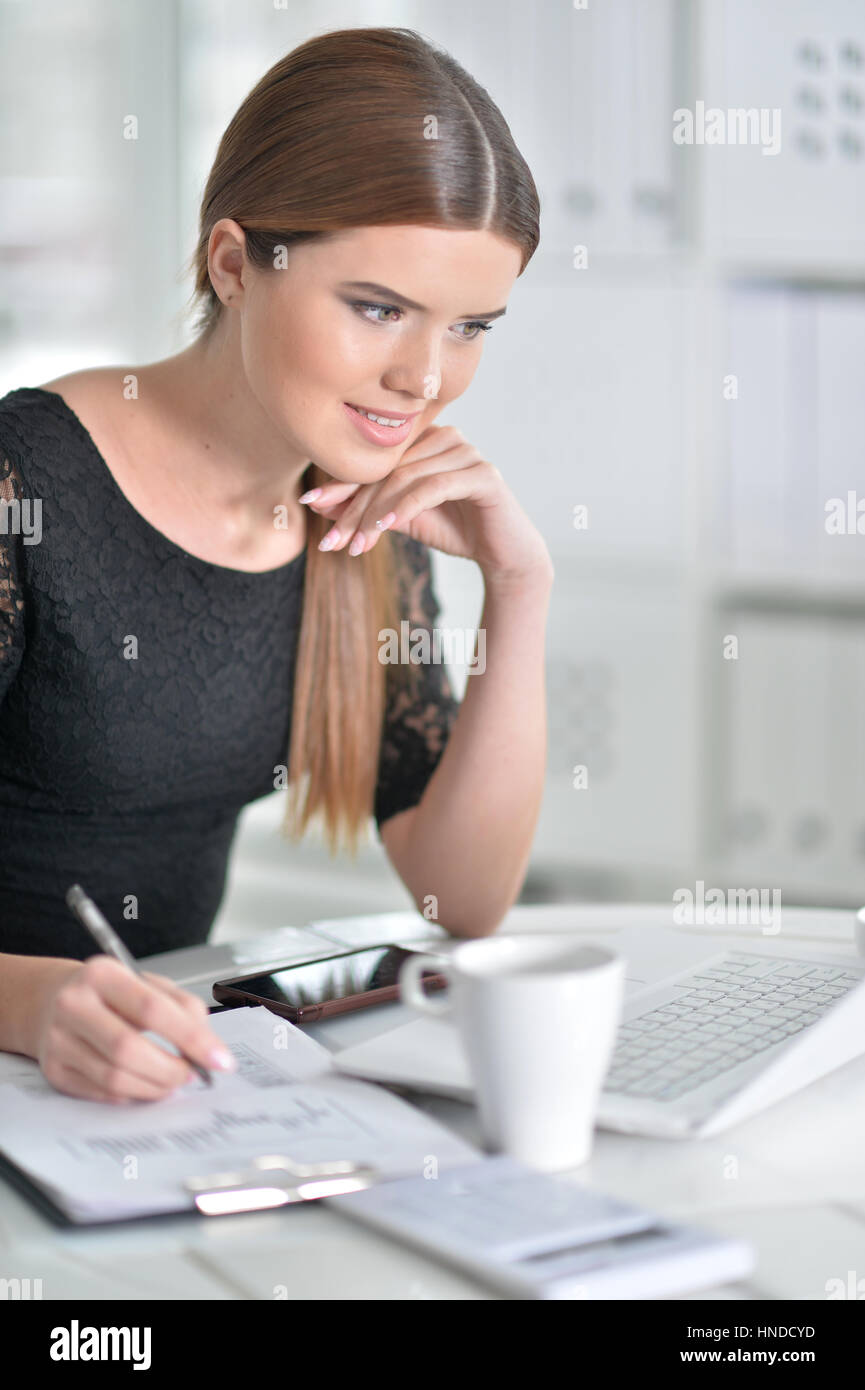Woman making notes  Stock Photo