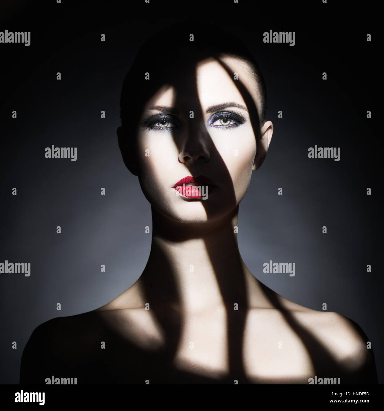 Elegant beautiful nude woman with perfect sexy body. Naked elegant lady pose in studio. Art