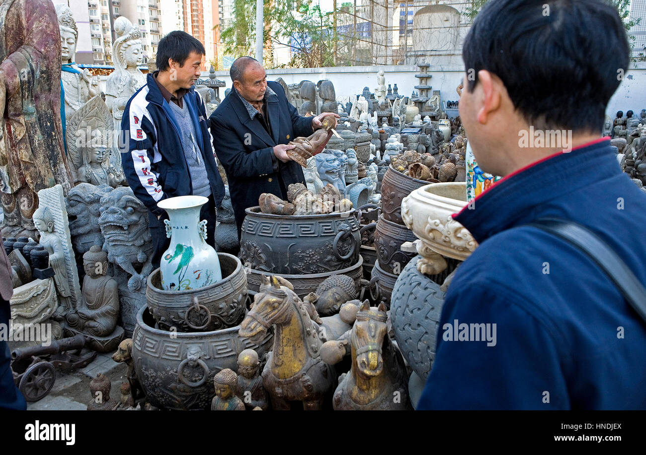 Statue, statues, selling sculptures in Panjiayuan market,Beijing, China
