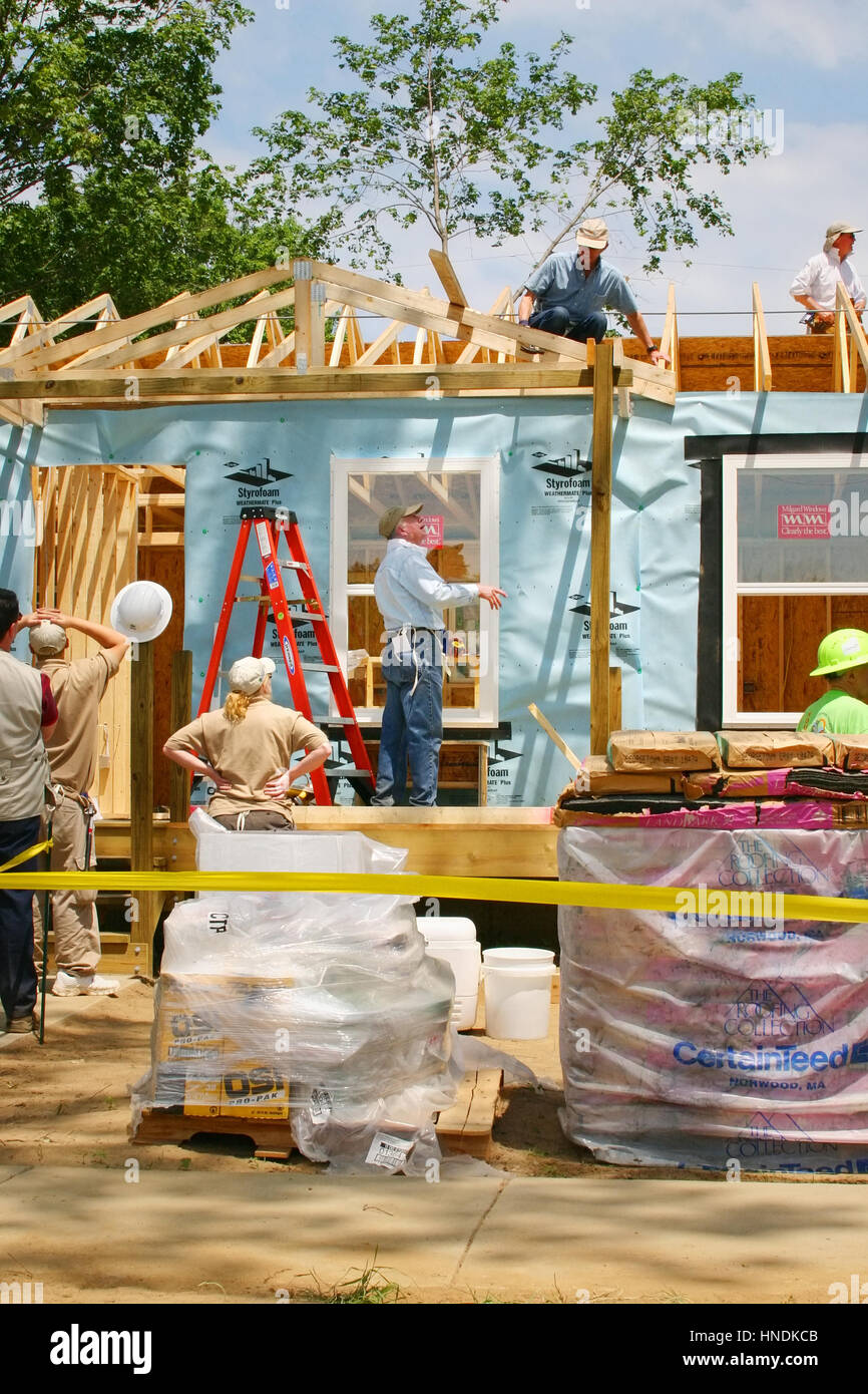 Former president Jimmy Carter building houses for Habitat for Humanity