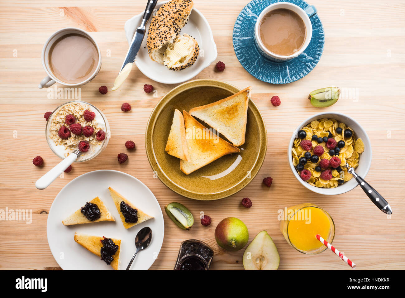 Breakfast table with various food Stock Photo - Alamy