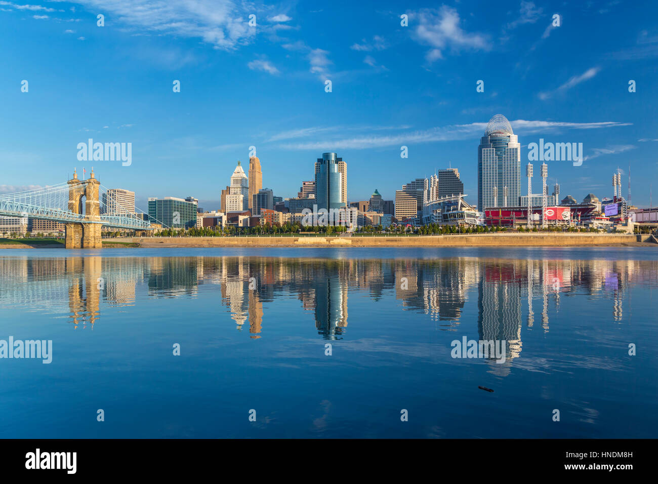 The city skyline and reflections in the Ohio River of Cincinnati, Ohio, USA. Stock Photo