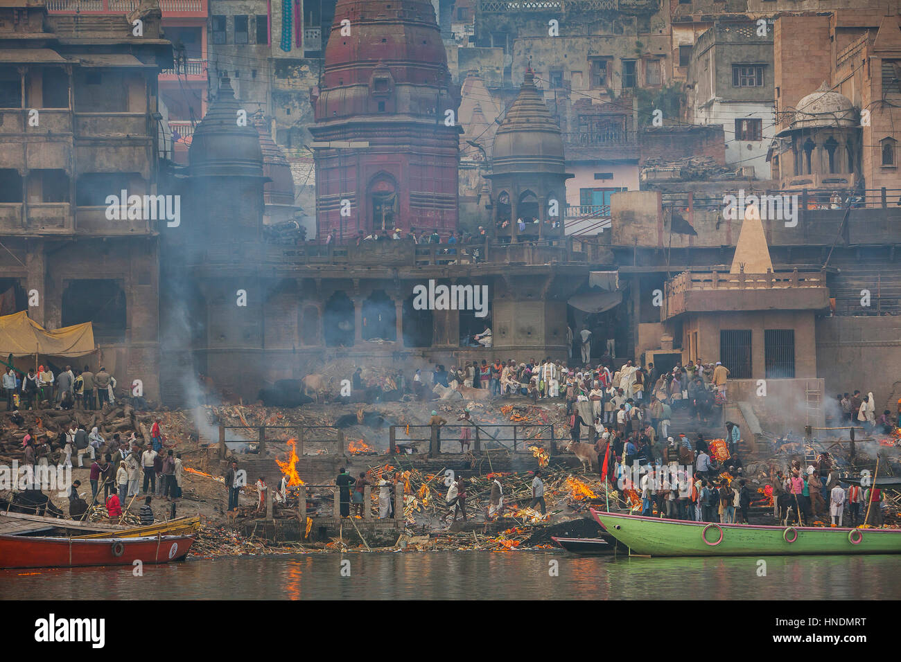 Landscape, panorama,panoramic,Cremation of bodies, in Manikarnika Ghat, the burning ghat, on the banks of Ganges river, Varanasi, Uttar Pradesh, India Stock Photo