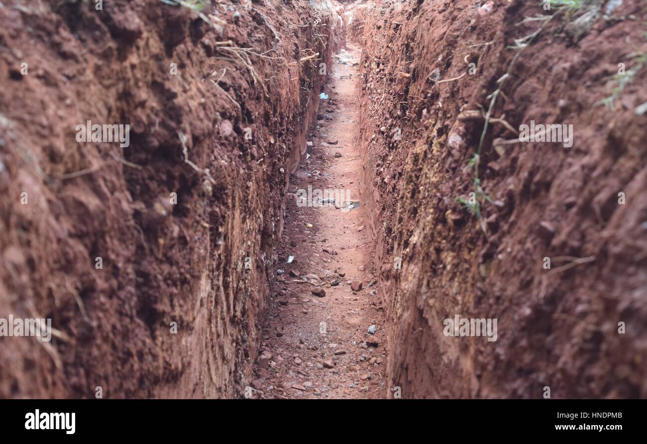 Dirt in a trench hole Stock Photo