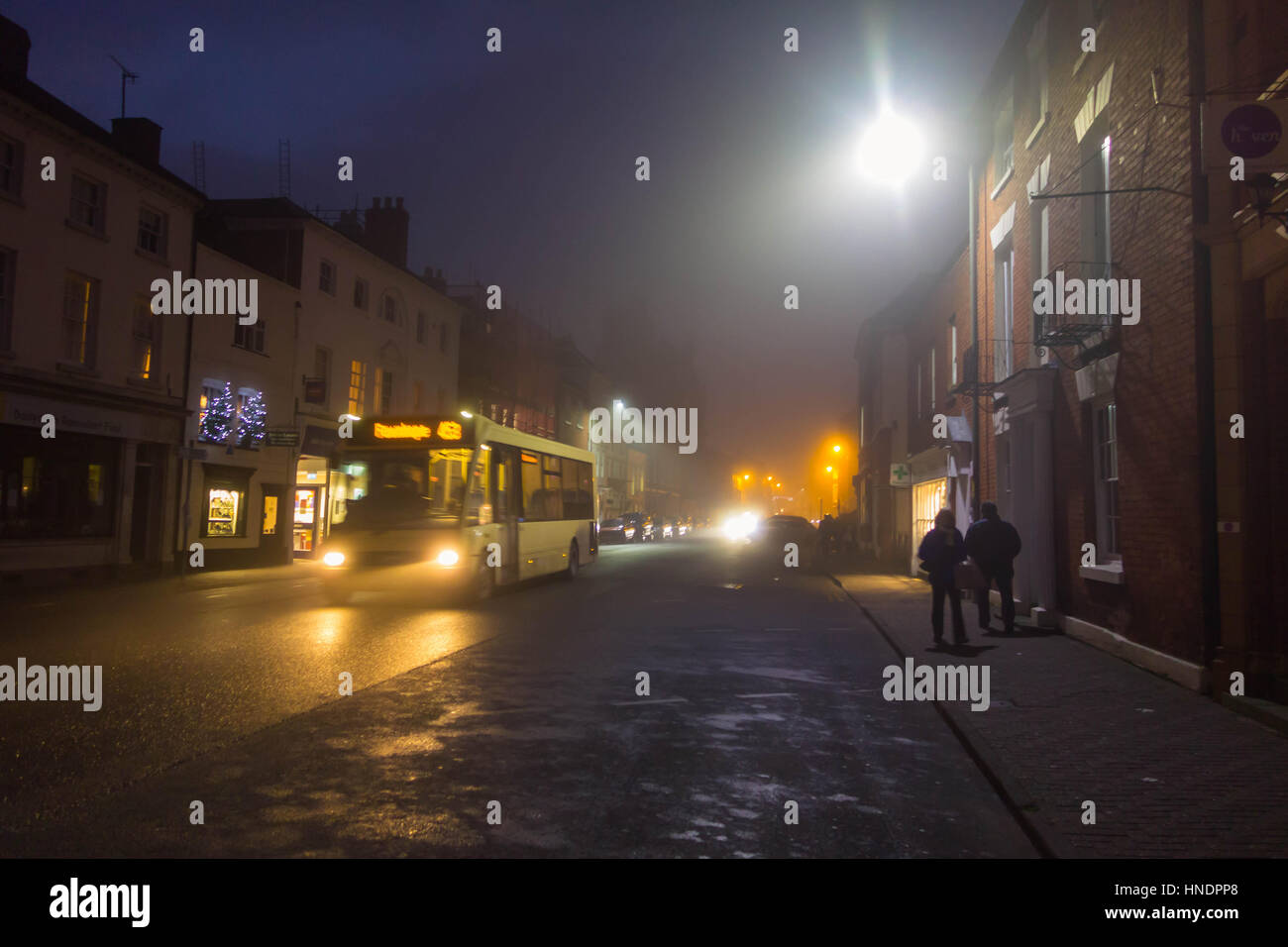 A cold and foggy winters evening in Hereford UK Stock Photo