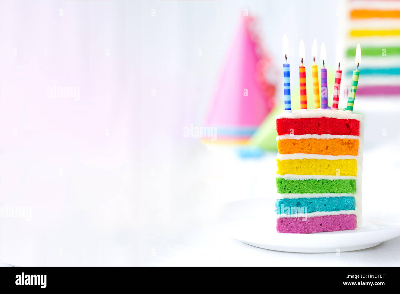 Rainbow birthday cake Stock Photo - Alamy