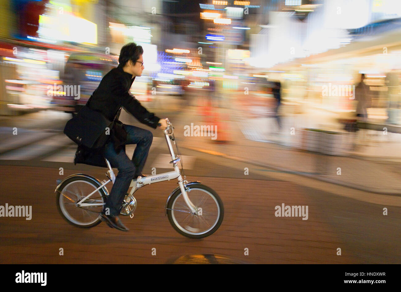 Biking, street scene in Dotombori,Osaka, Japan,Asia,Osaka, Japan,Asia Stock Photo