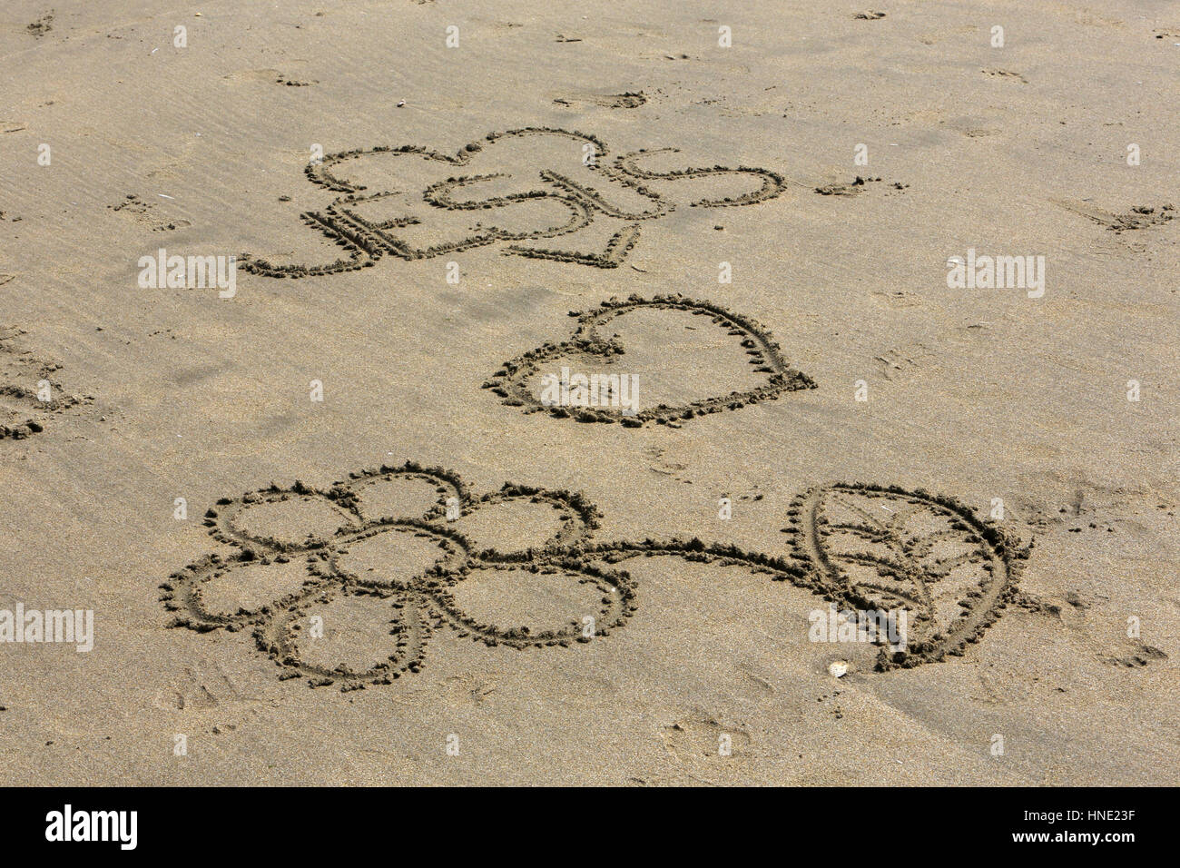 Dessin sur le sable hi-res stock photography and images - Alamy