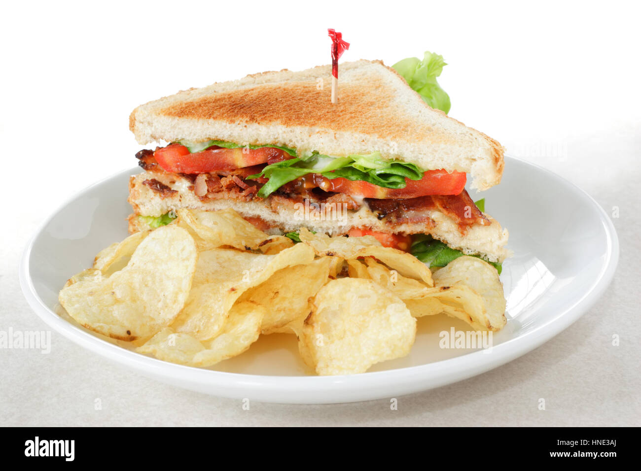 Bacon Lettuce Tomato Sandwich with Potato Chips Stock Photo Alamy