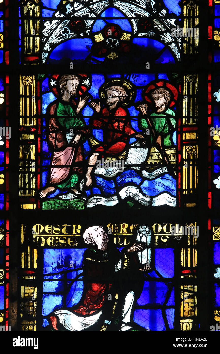 St. Peter walking on the waters. Stained glass window from the 13th century. Chapel of St. Vincent or Notre-Dame of Lourdes. Cathedral of Saint-Pierre Stock Photo