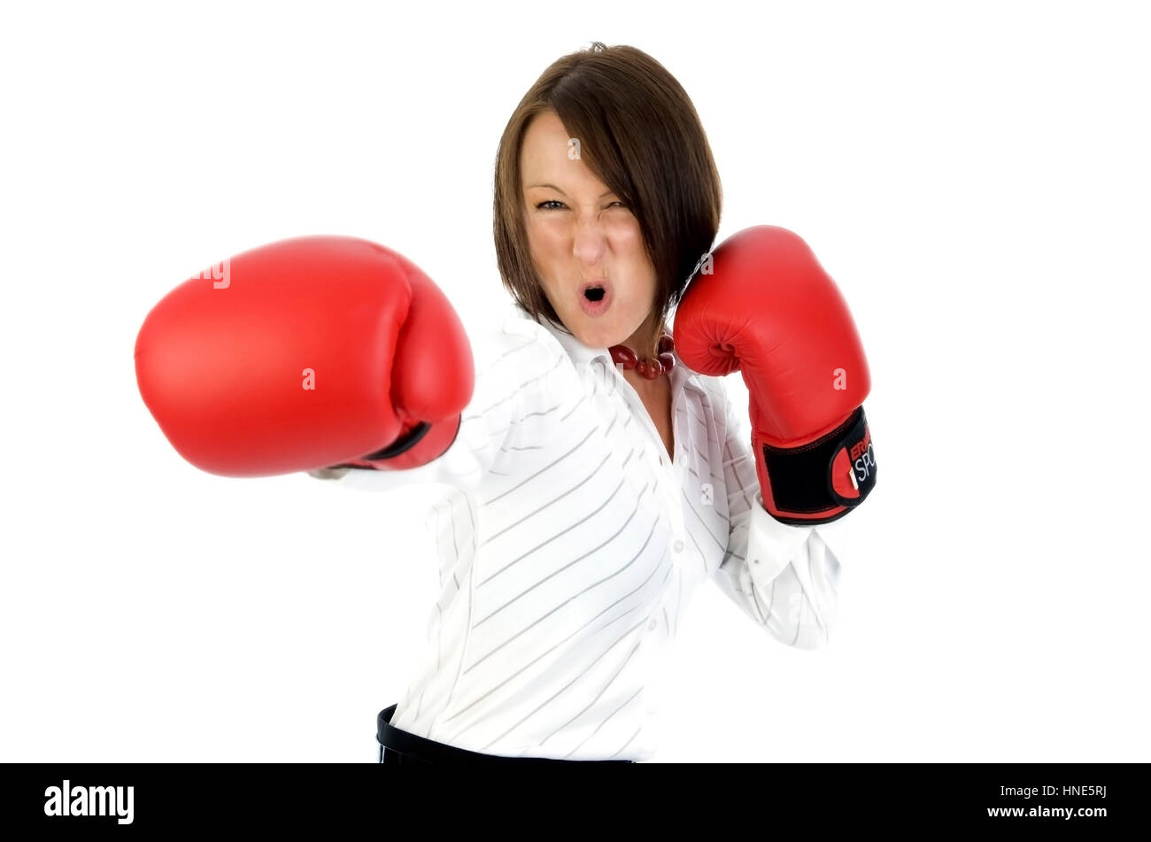 Model release, Junge Geschaeftsfrau mit Boxhandschuhen - young business woman with boxing gloves Stock Photo