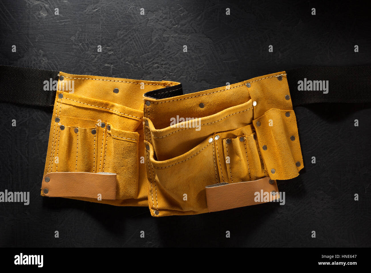 tool belt on black background Stock Photo - Alamy