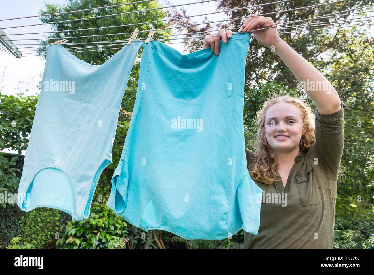 Woman washing clothes home hires stock photography and images Alamy