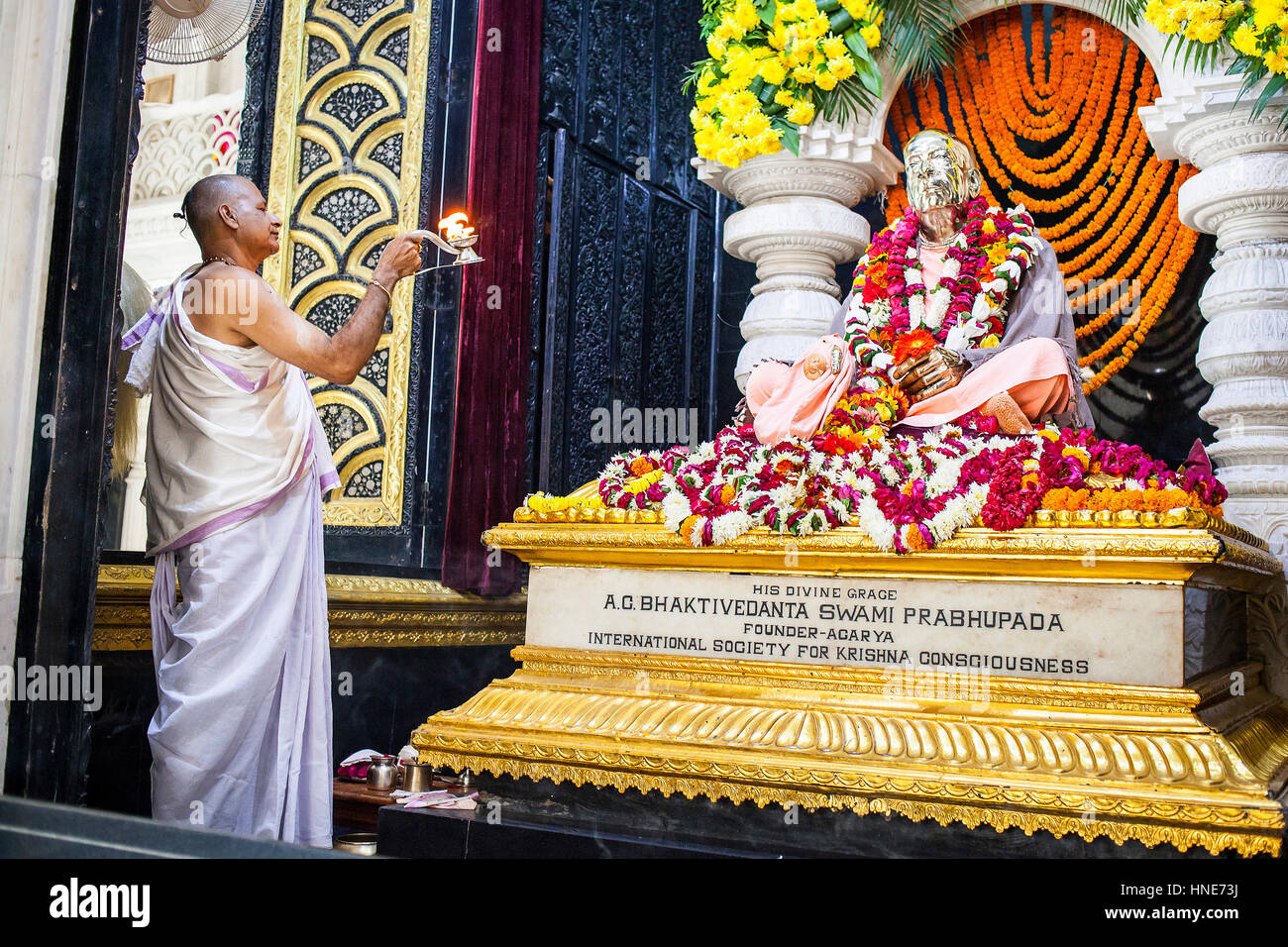 Praying, statue of A. C. Bhakivedanta Swami Prabhupada the founder of hare Krishna movement, in  ISKCON temple, Sri Krishna Balaram Mandir,Vrindavan,M Stock Photo
