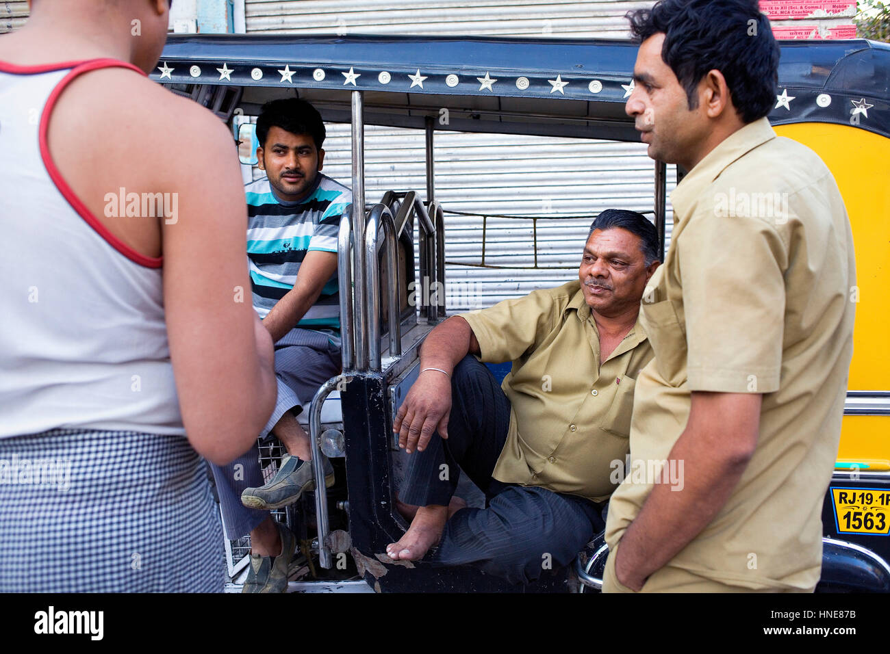 Drivers of Tuktuk taxi speaking,Jodhpur, Rajasthan, India Stock Photo