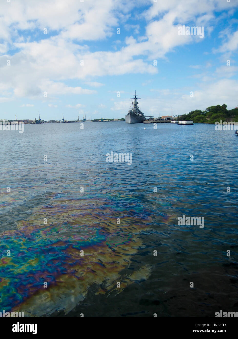 Oil still floats on the top of the water where it was spilled when the USS Arizona was sunk during the attack on Pearl Harbor, Oahu, Hawaii. Stock Photo