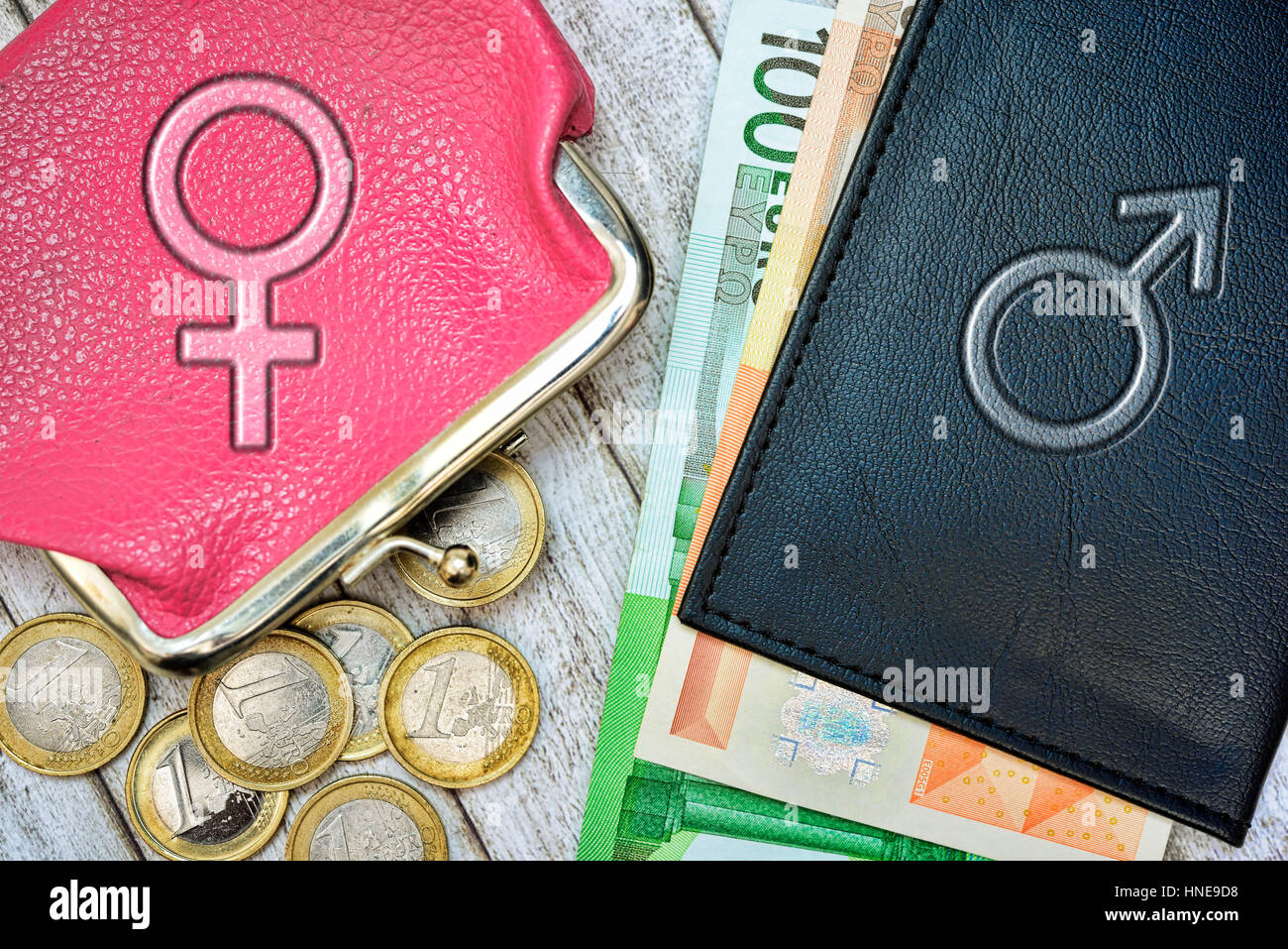 Change purses of man and woman with monetary coins and bank notes, symbolic photo for wage inequality, Geldbörsen von Mann und Frau mit Geldmünzen und Stock Photo