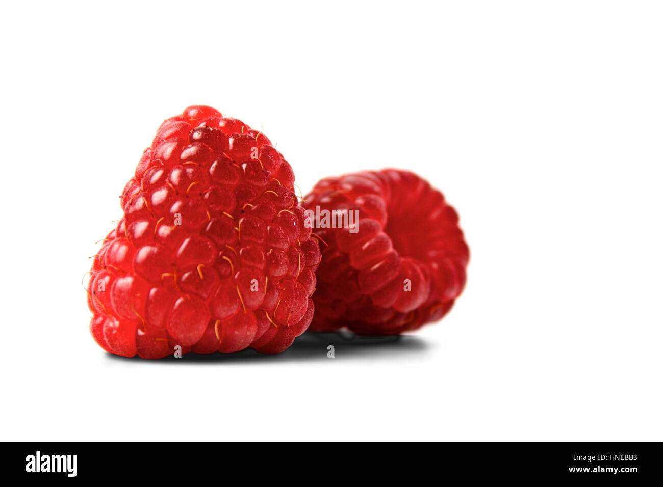 Red raspberries on white backgroud Stock Photo