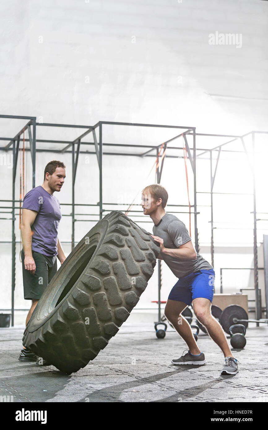 Man flipping tire hi-res stock photography and images - Alamy