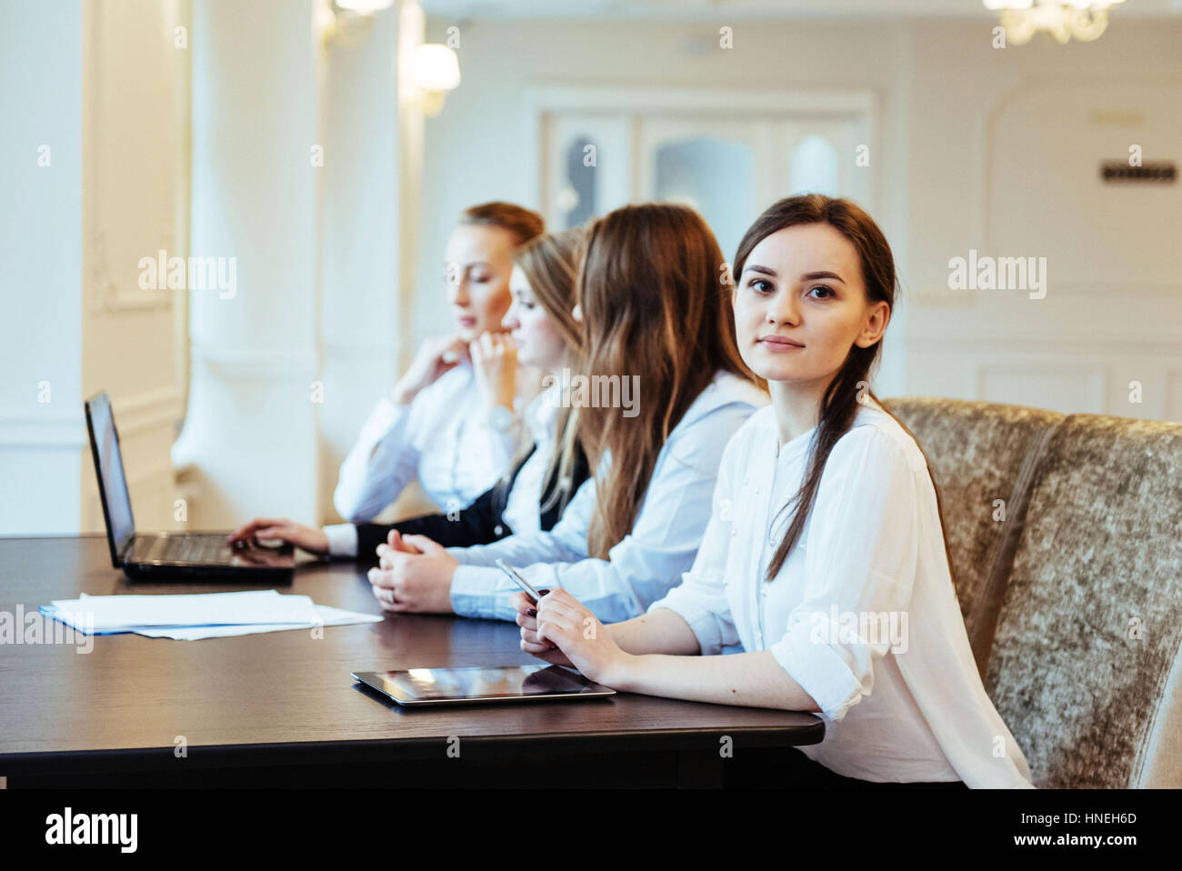 Students with laptops and tablet Stock Photo