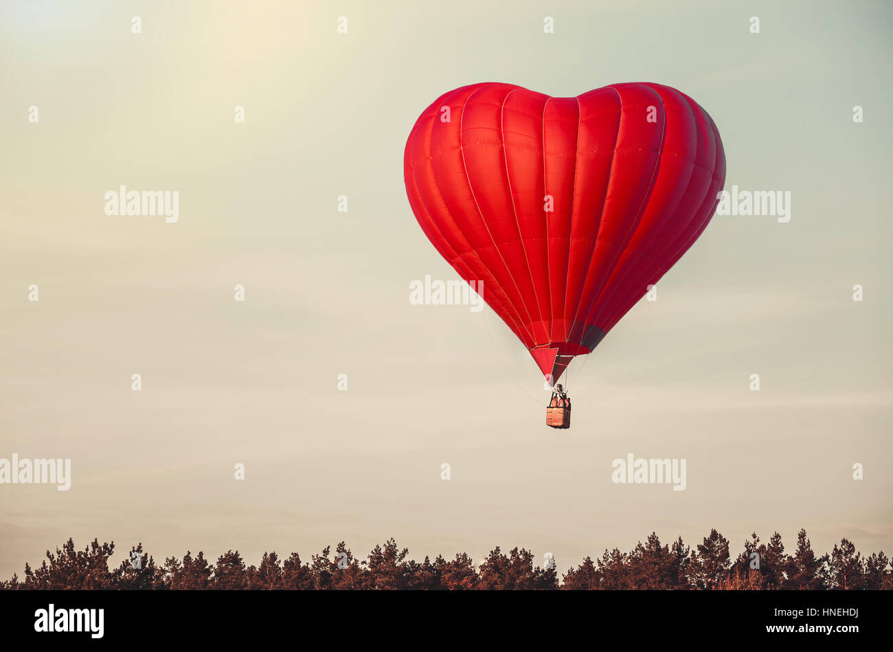 Red balloon in the  sky Stock Photo