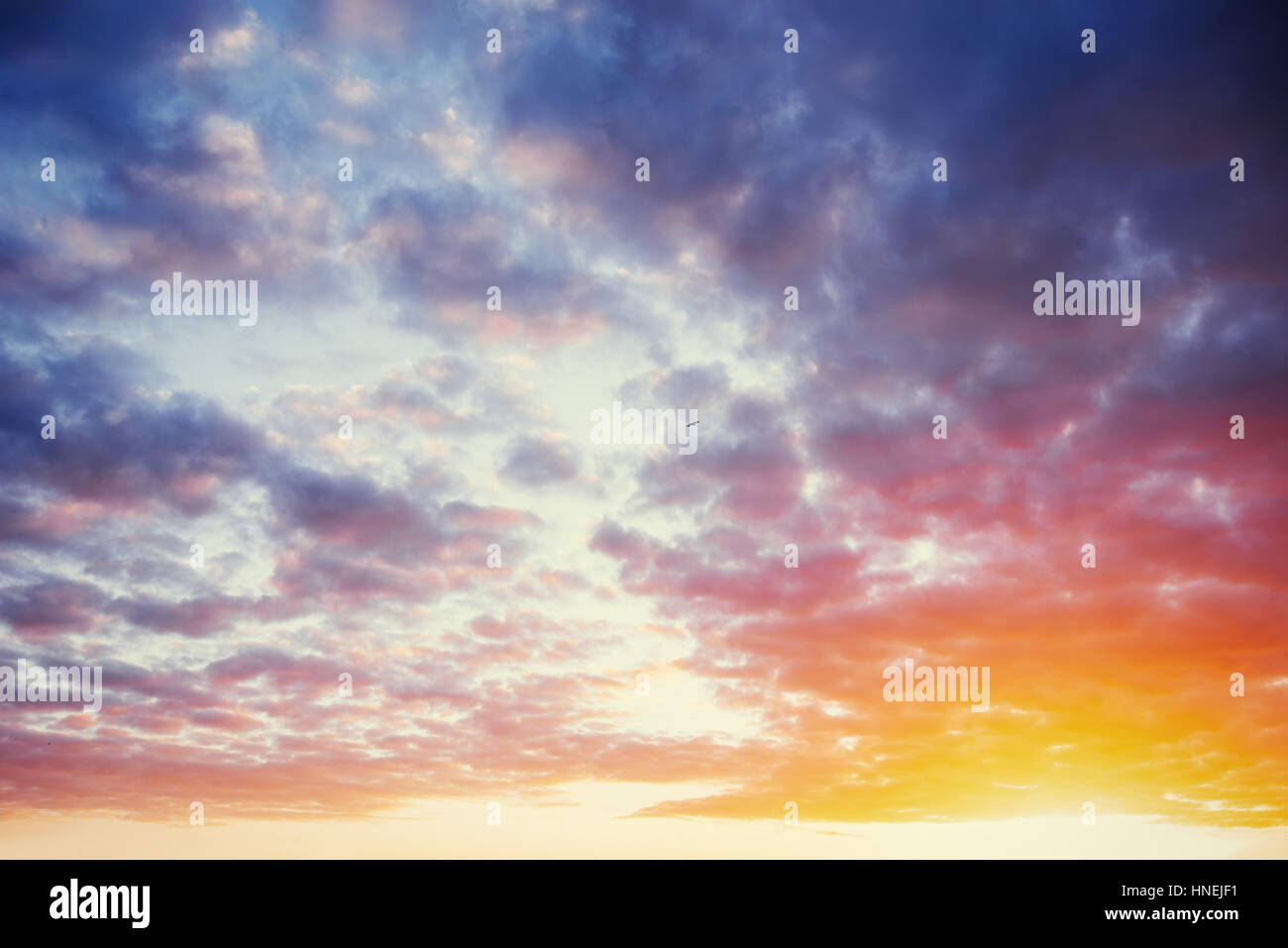 cumulus clouds at sunset Stock Photo - Alamy