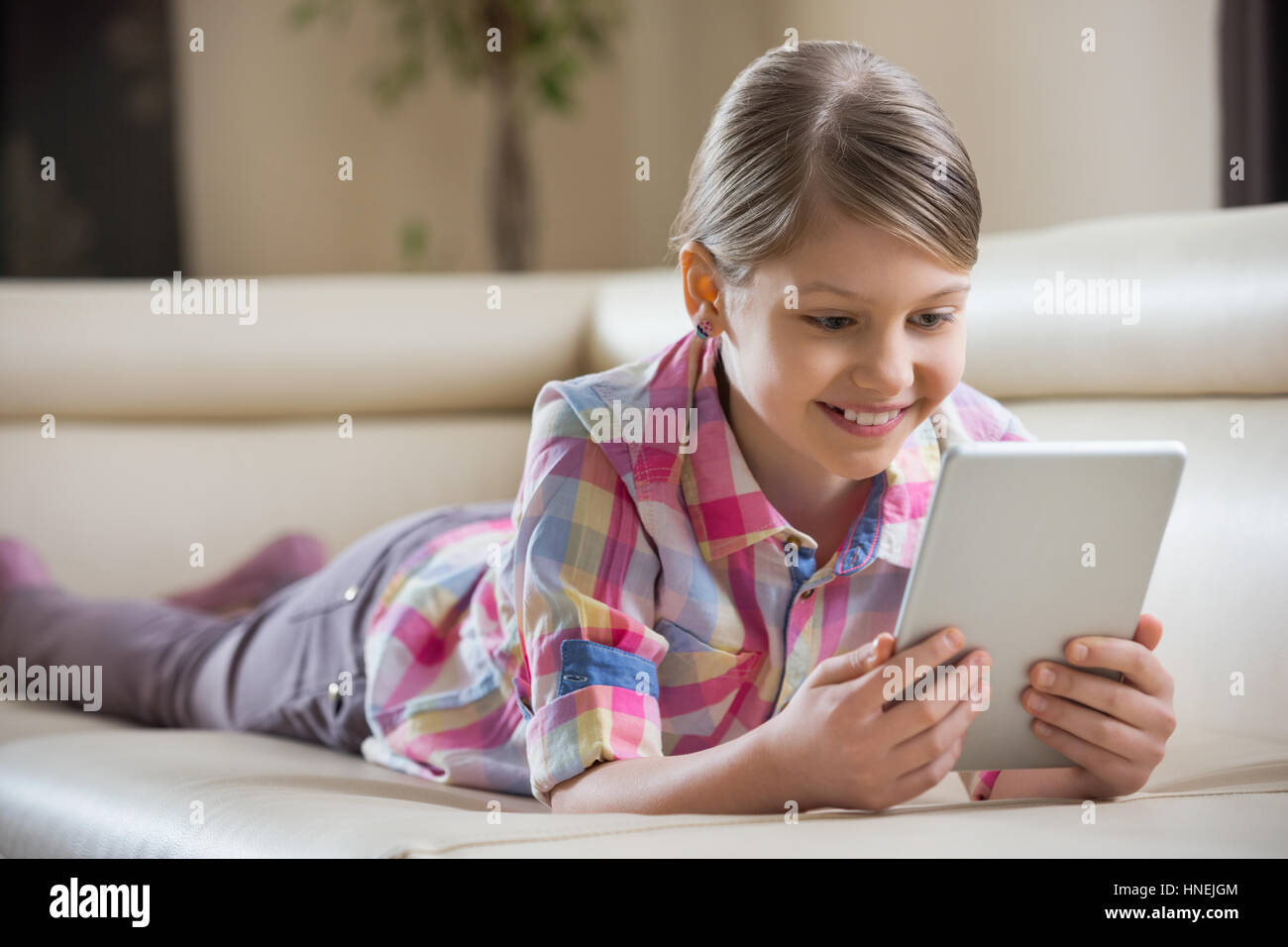 Pre teen girl sofa hi-res stock photography and images - Alamy