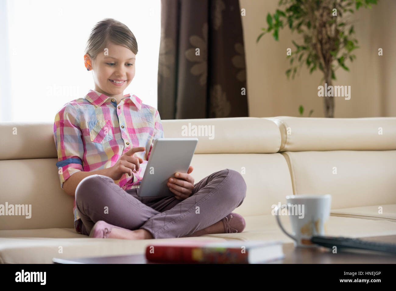 Pre teen girl sofa hi-res stock photography and images - Alamy