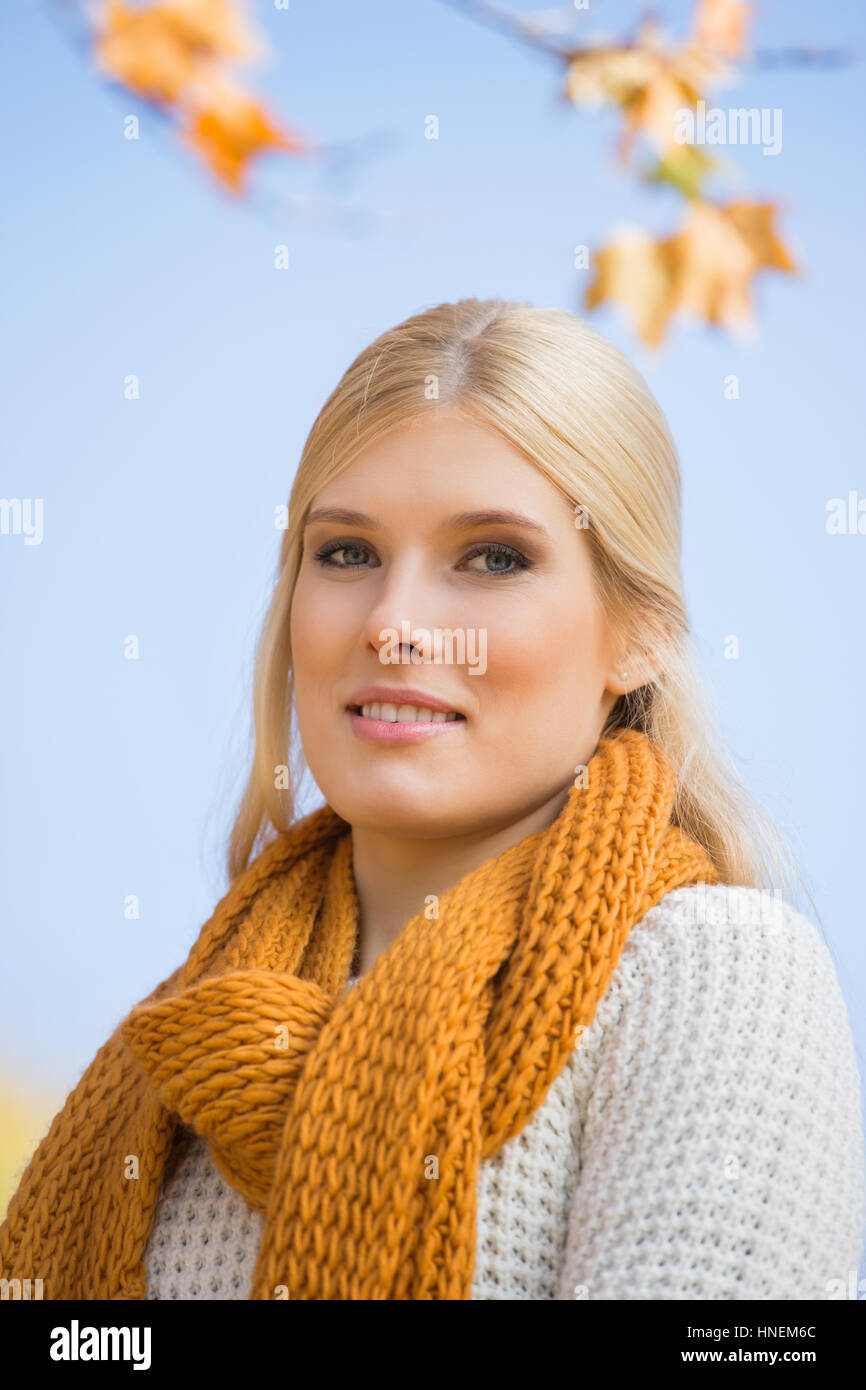 Portrait of beautiful woman smiling against sky Stock Photo