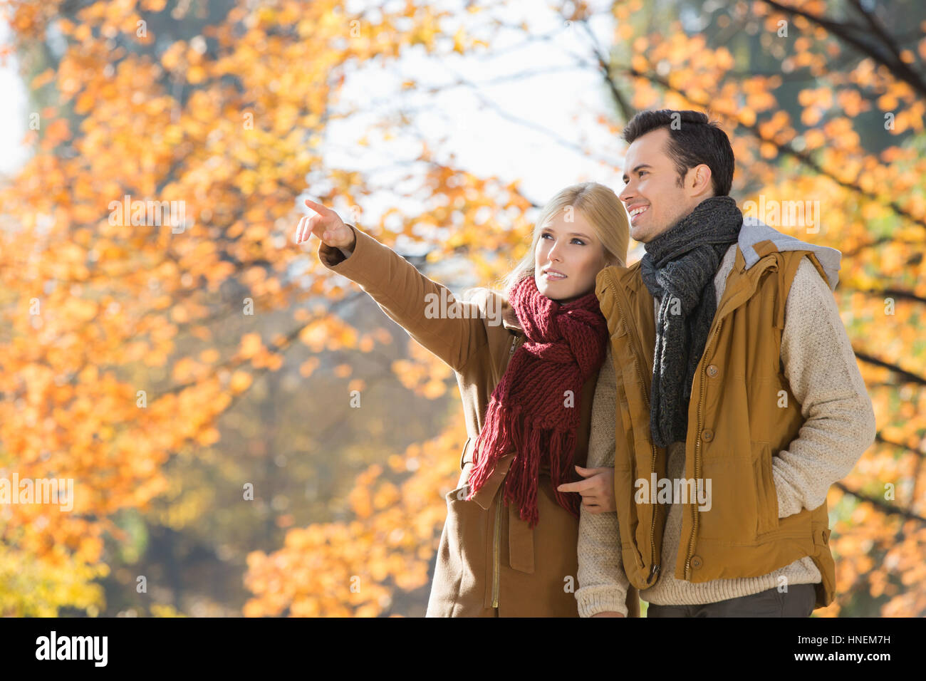 Women pointing at man hi-res stock photography and images - Alamy