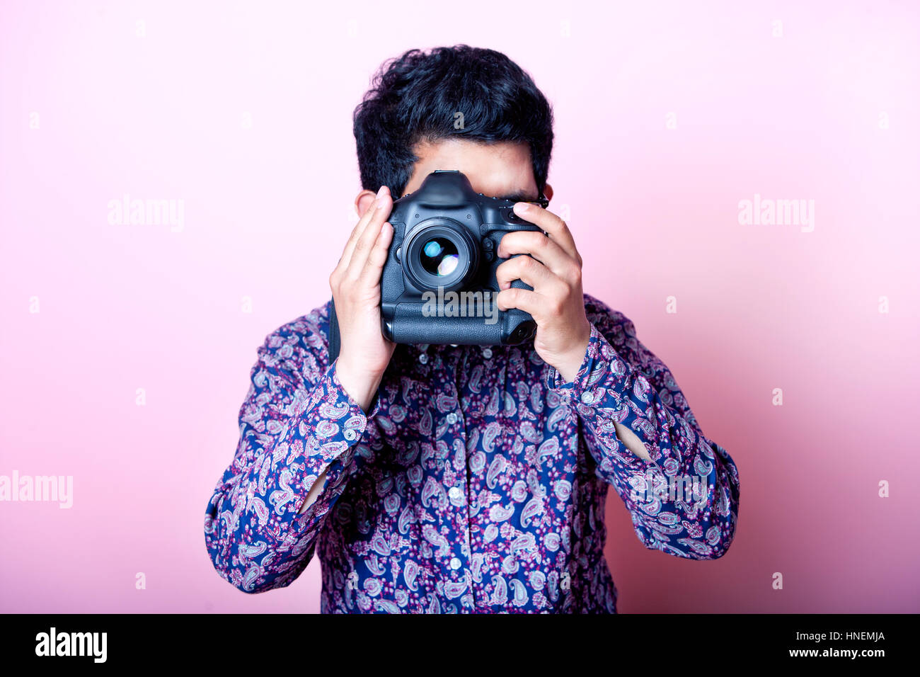 Taking photograph hiding hi-res stock photography and images - Alamy