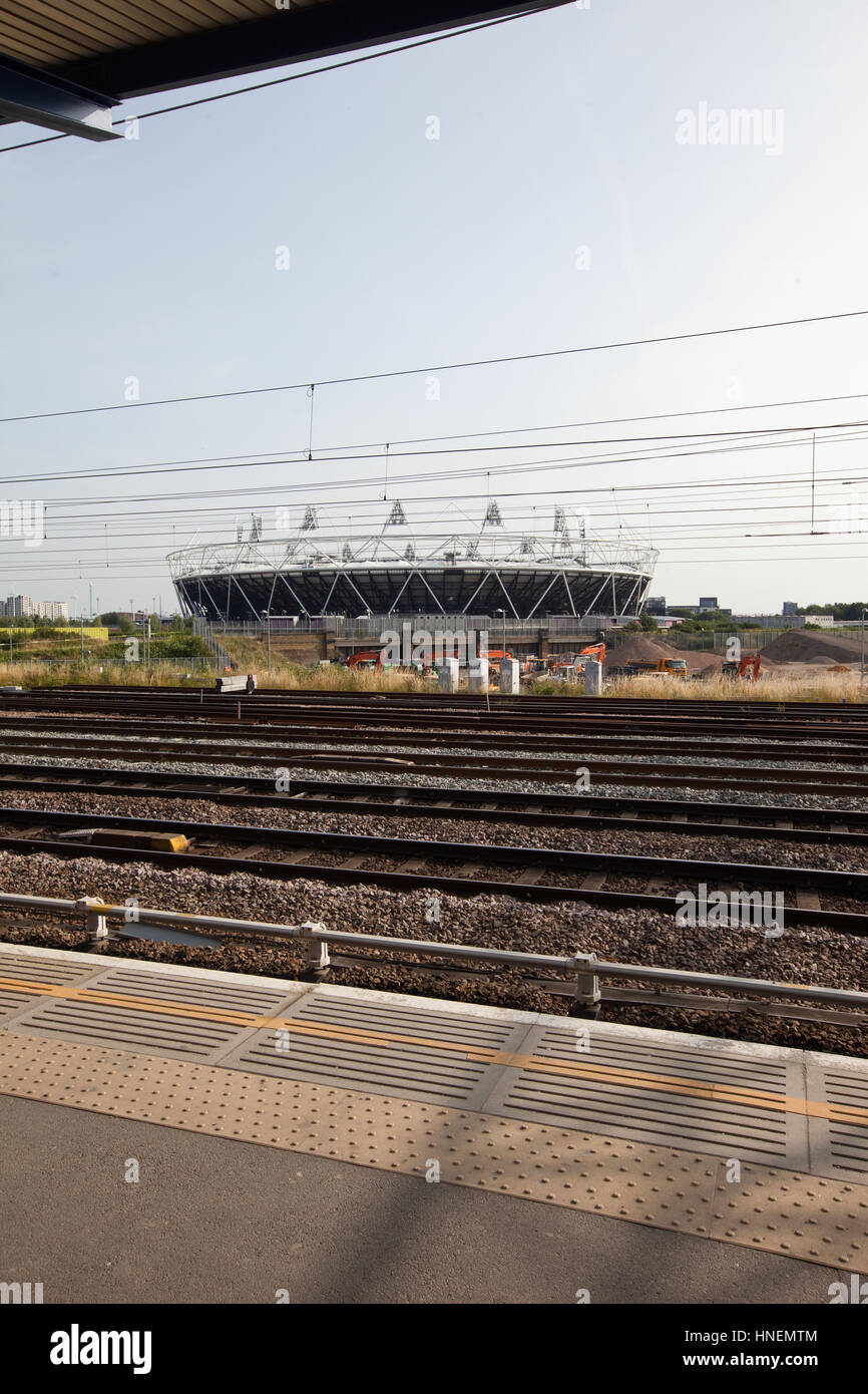 View of railway tracks through platform Stock Photo