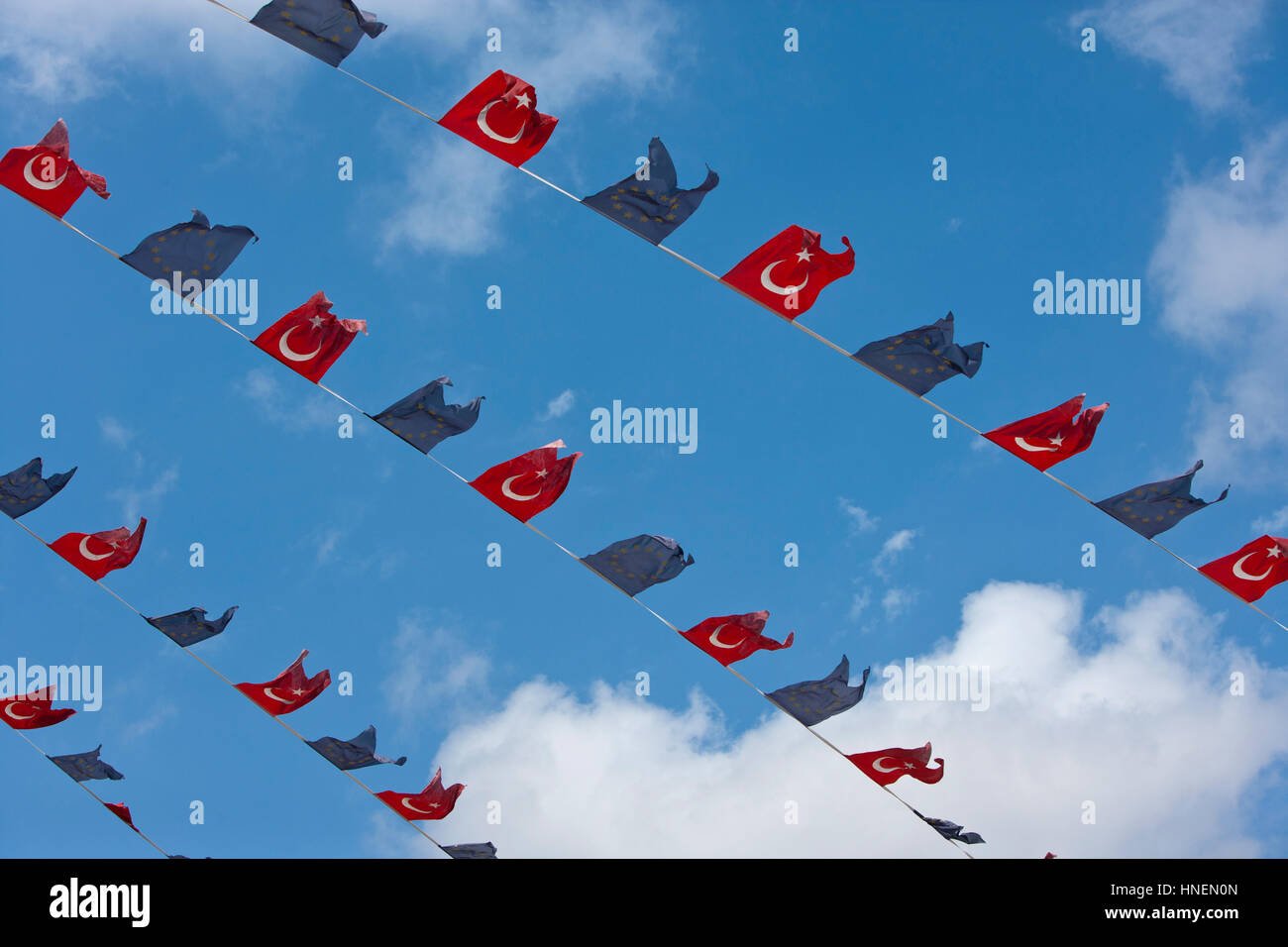 Close-up view of Turkish and EU bunting against clear sky Stock Photo