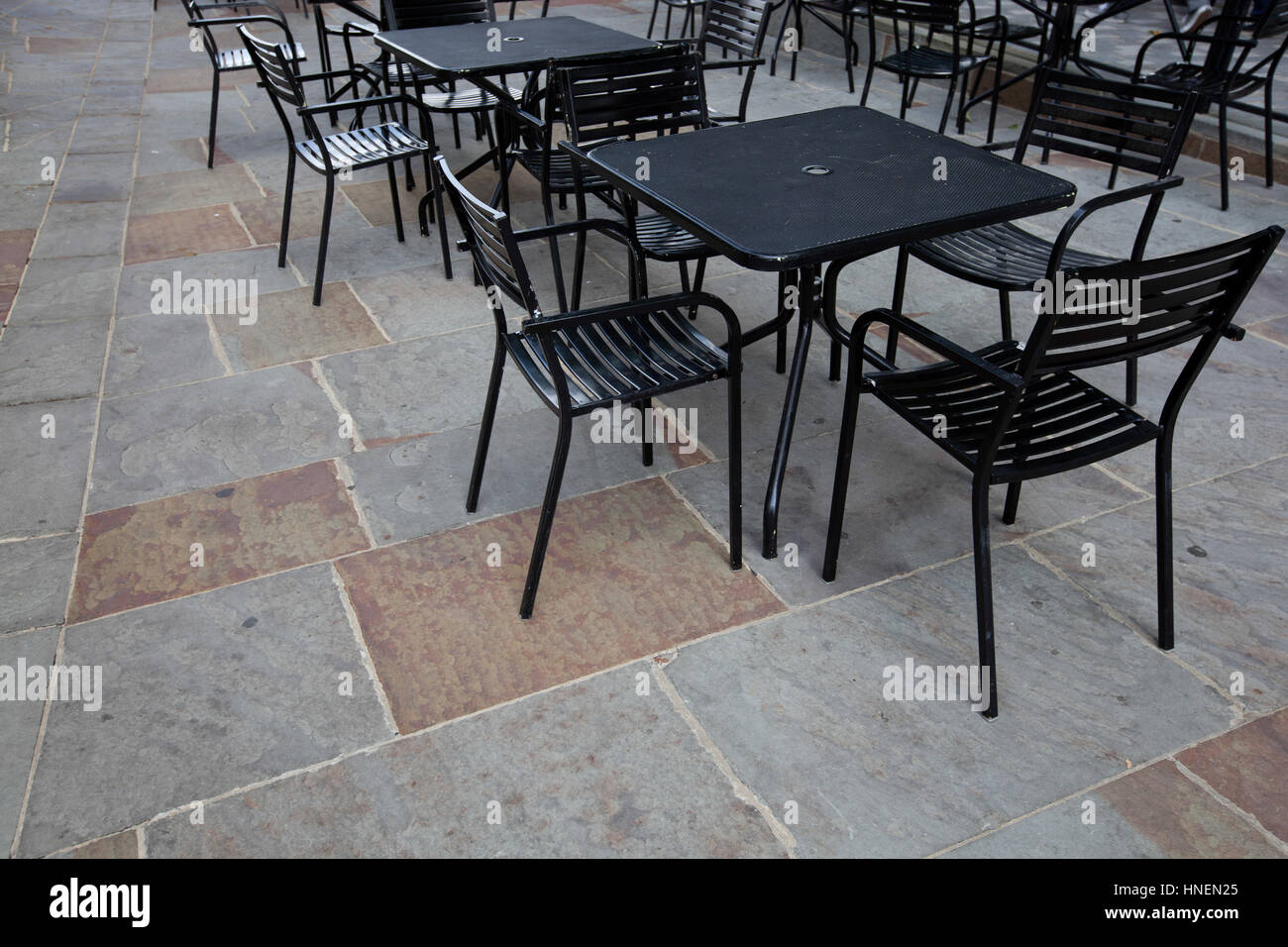 Tables and chairs at outdoor cafe Stock Photo