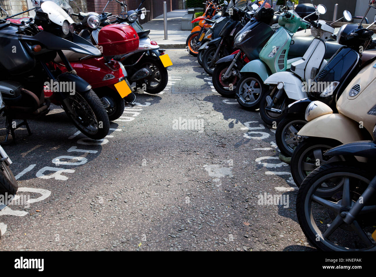 Motor bikes parked in a row Stock Photo