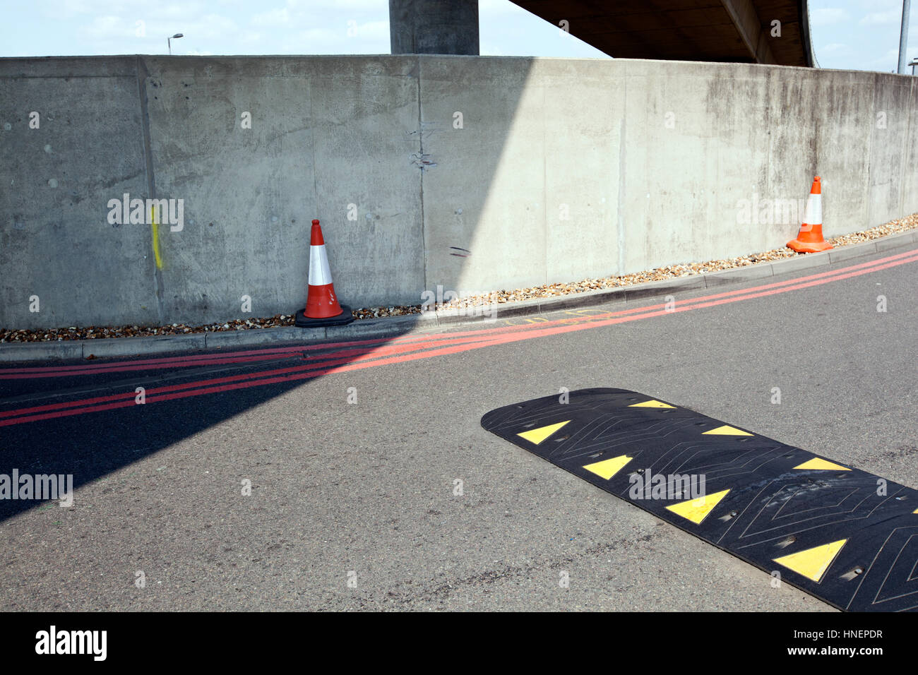 Speed bump in the middle of the road Stock Photo