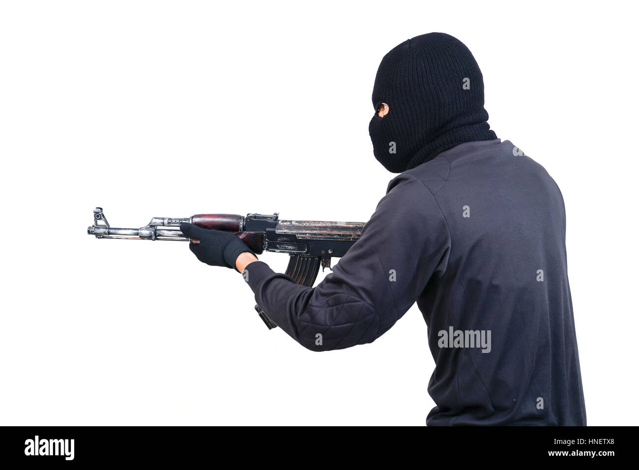 terrorist with ak47 machine gun isolated on white background Stock Photo