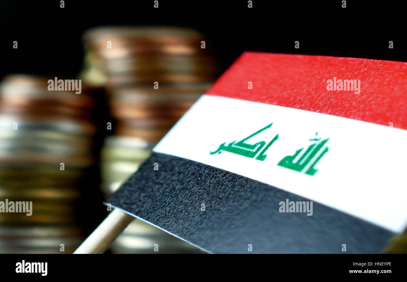 Iraq Money Stack Iraq flag waving with stack of money coins macro Stock Photo - Alamy