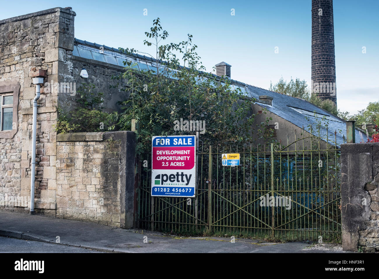 Derelict mill at Sabden, Lancashire, for sale for redevelopment. An