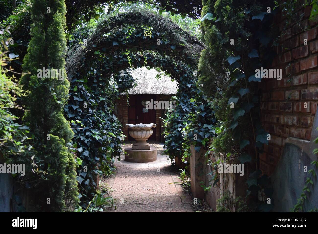 Secret garden arch Stock Photo