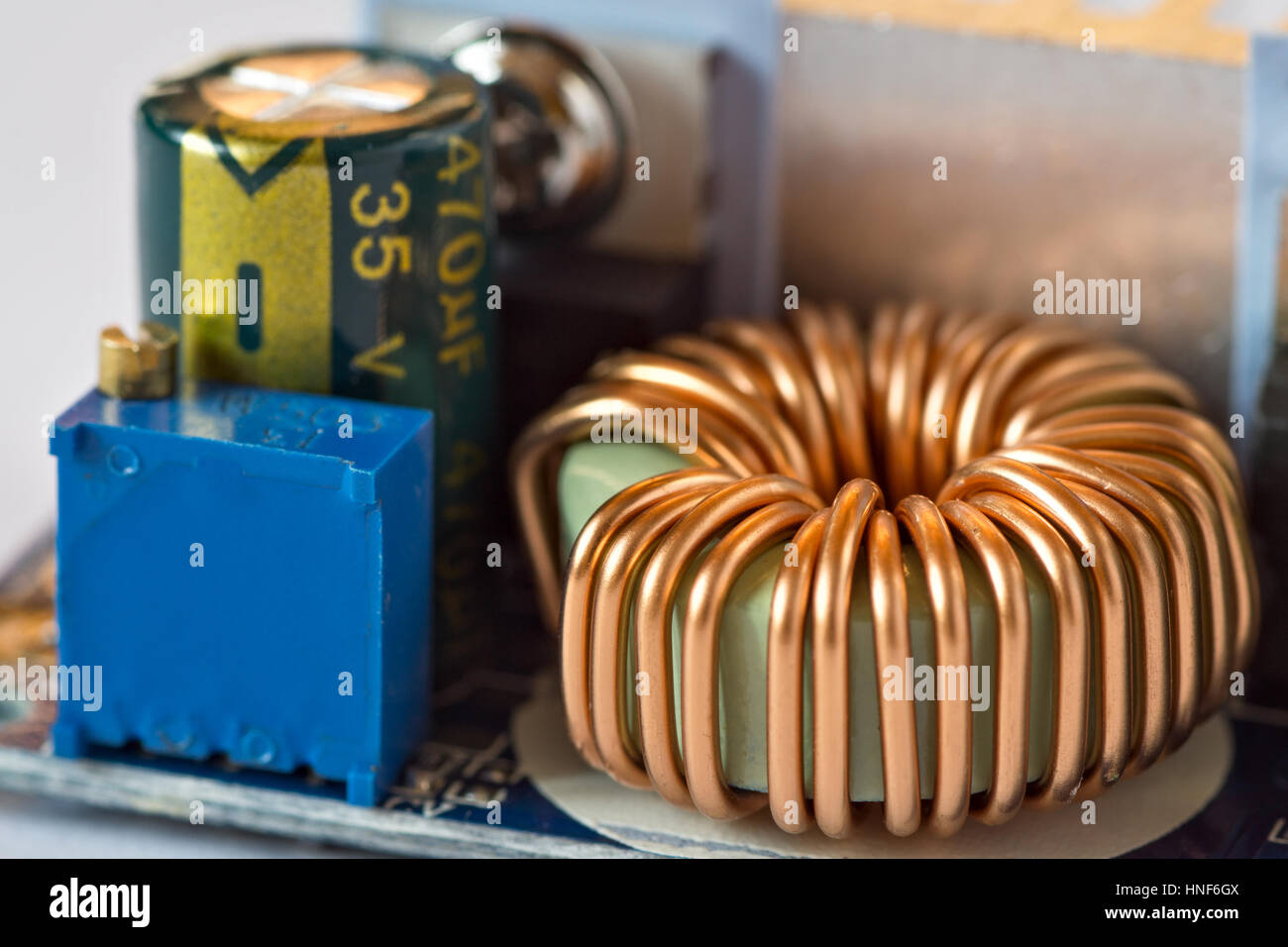 Inductance coil on circuit board Stock Photo