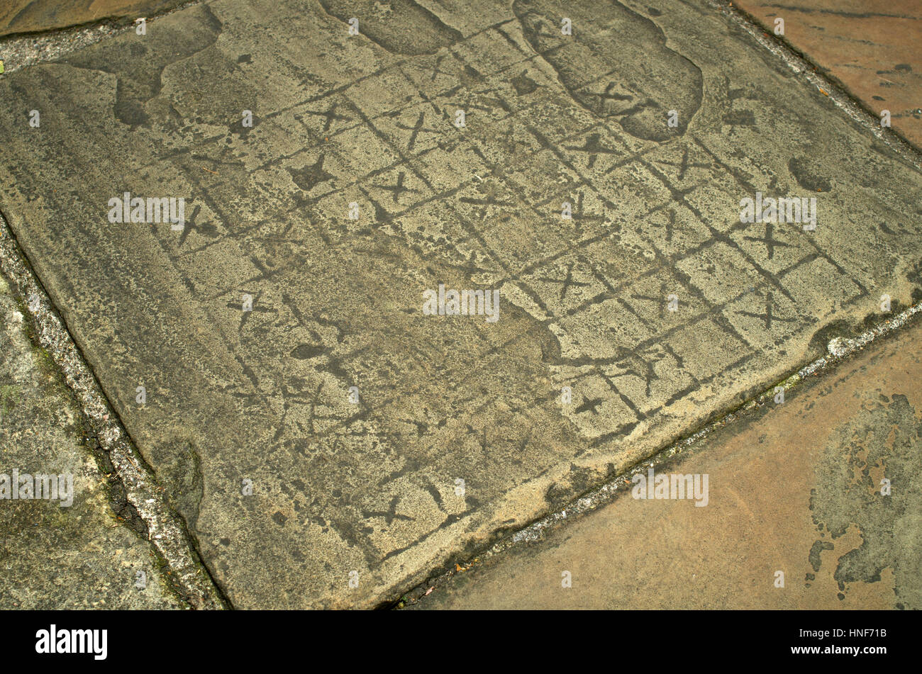 Board game carved into flag stone York City Walls pavement walkway UK Stock Photo Alamy