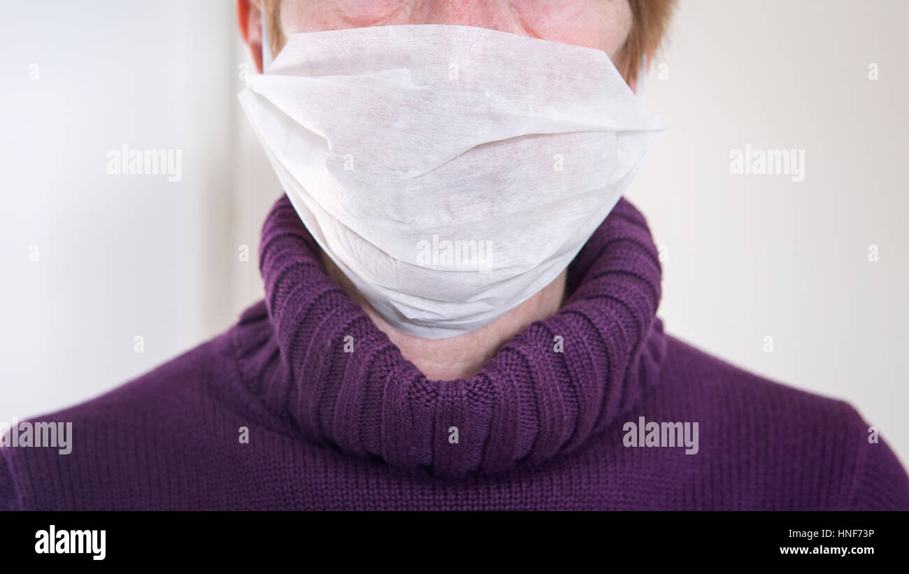 Older woman wearing a face mask hi-res stock photography and images - Alamy