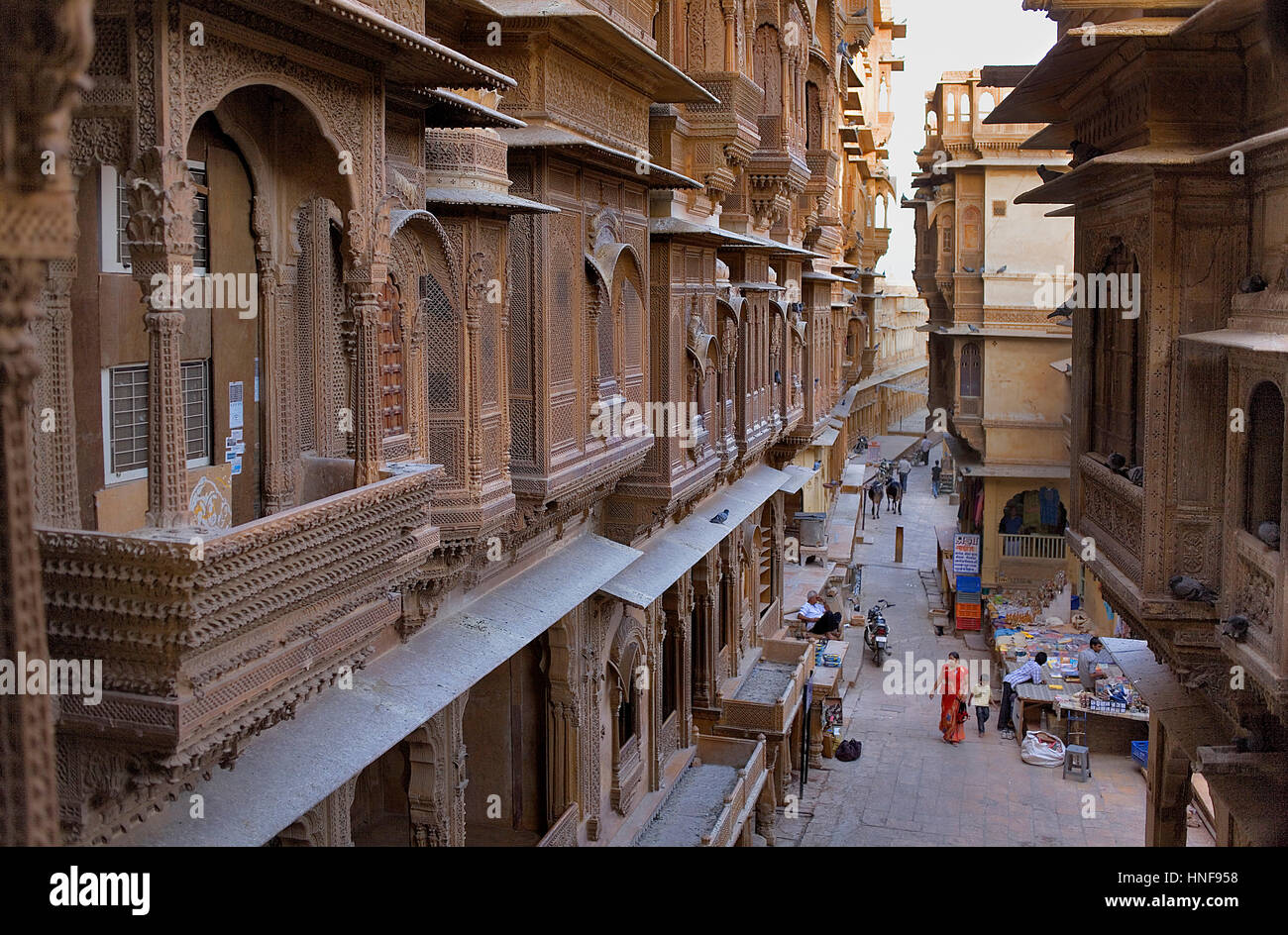 Street scene, at left Patwa-ki Haveli,Jaisalmer, Rajasthan, India Stock Photo