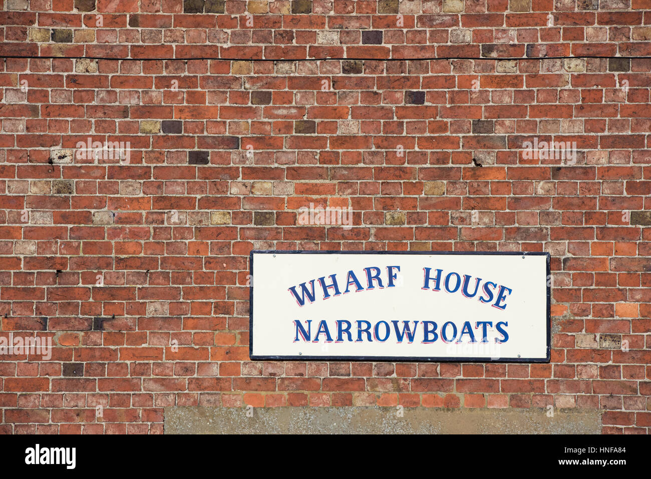 Wharf house narrowboats sign on the Grand Union Canal. Braunston, Northamptonshire, UK Stock Photo