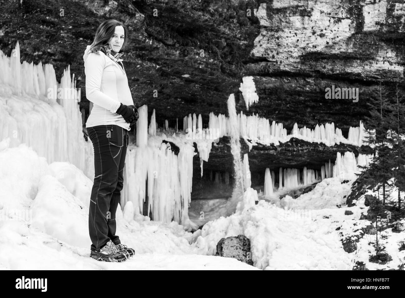 Black and white portrait of pregnant woman in winter. Stock Photo