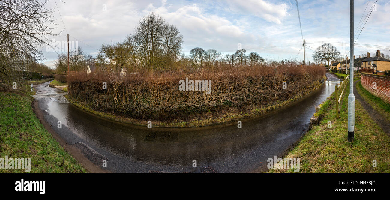 Flooded road and fords in Caxton near Cambridge, England, UK Stock Photo