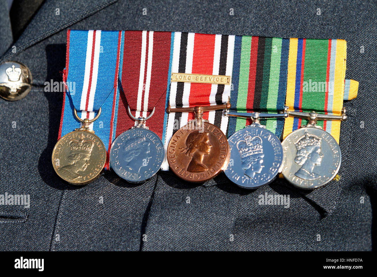 Northern Ireland RUC and special constabulary medals on RAF reservists chest includes golden jubilee medal (left) diamond jubille medal (2nd left) spe Stock Photo