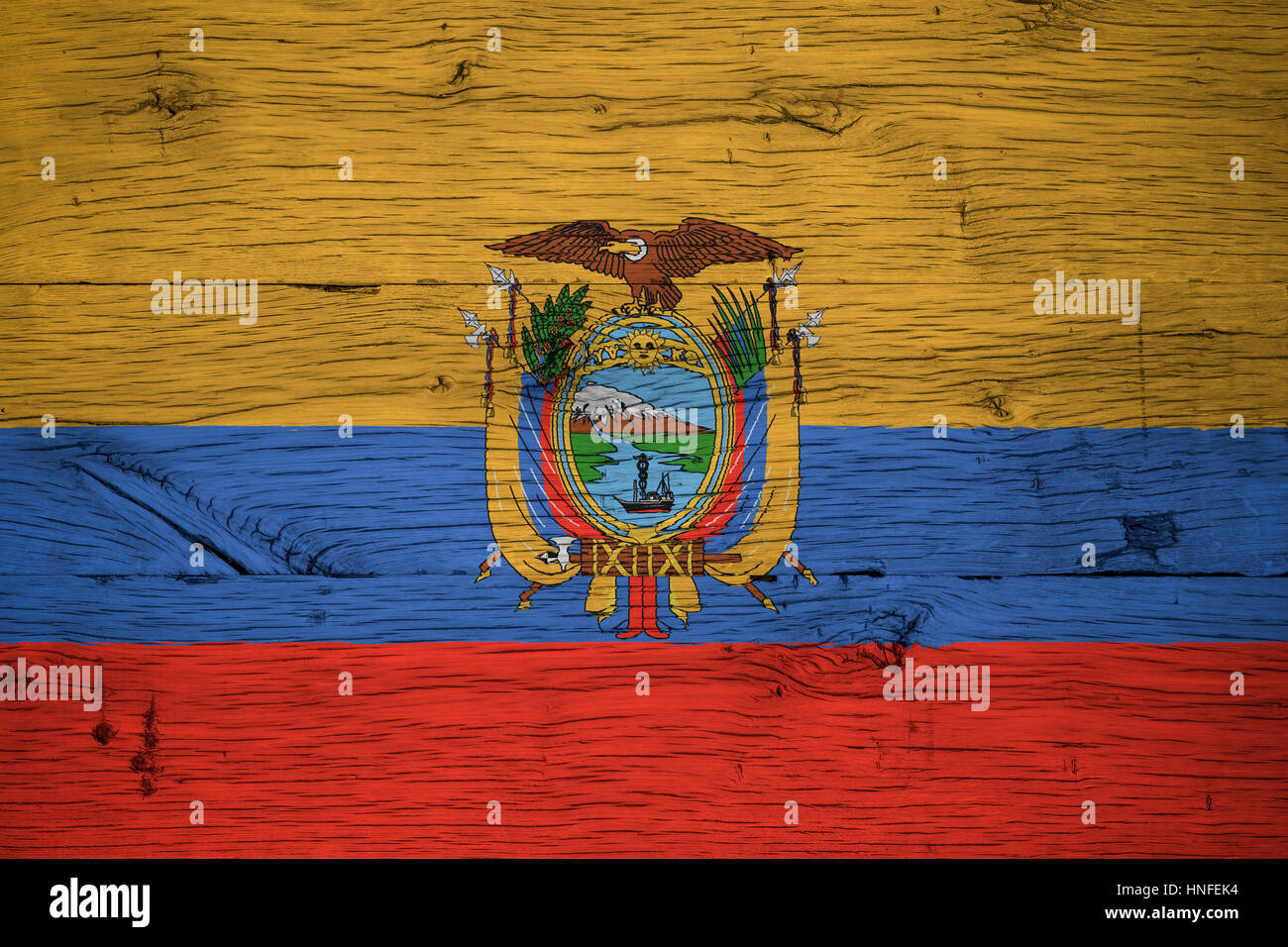 Ecuador national flag painted on old oak wood. Painting is colorful on planks of old train carriage. Stock Photo